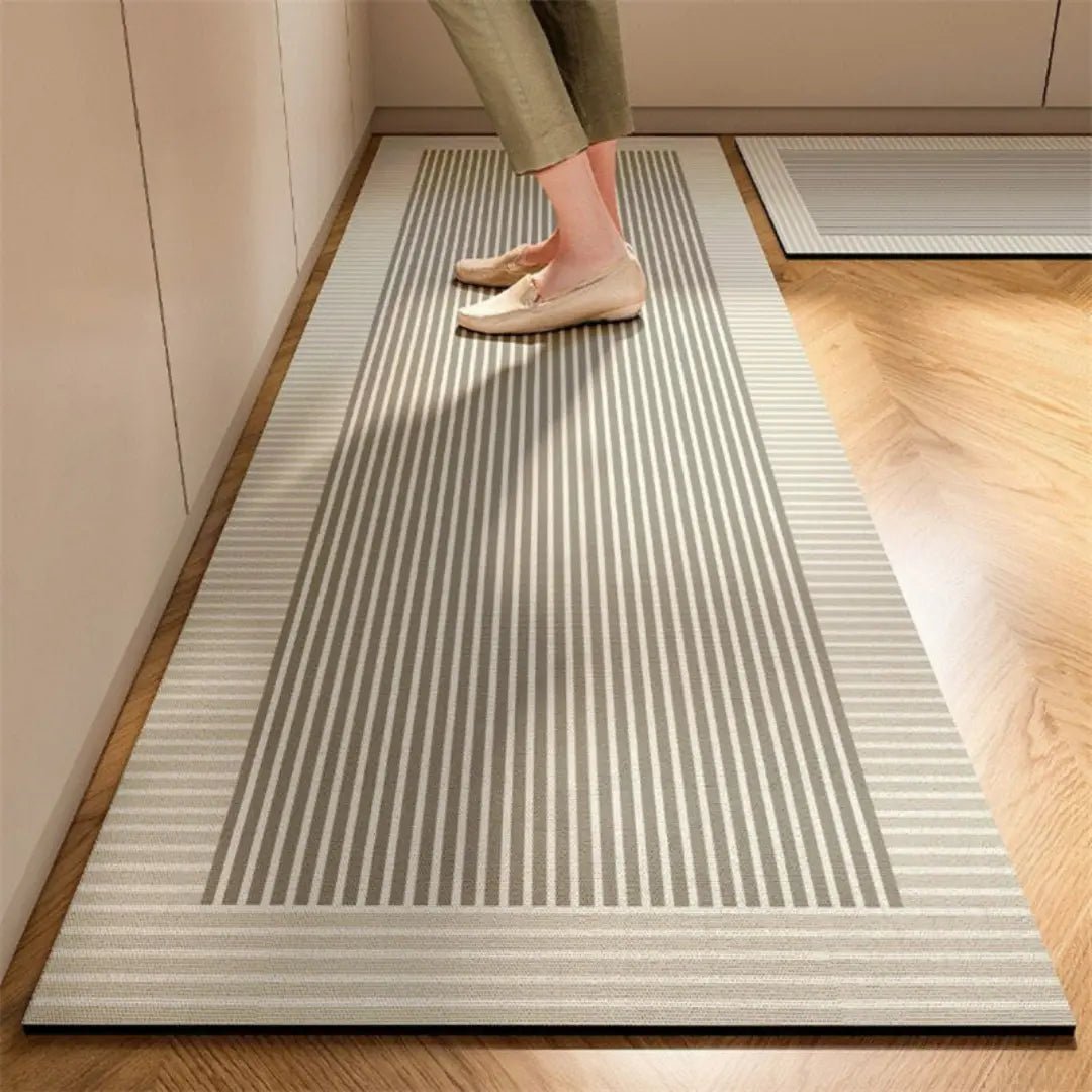 Alfombra de cocina anatómica antifatiga con superficie absorbente y antideslizante