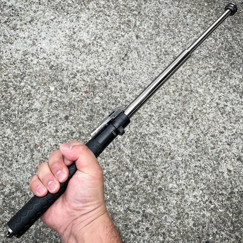 Bastón extensible automático de acero