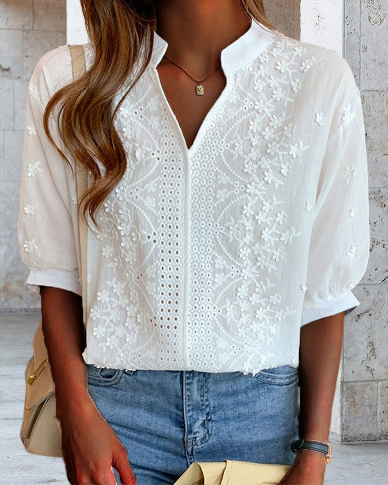 Blusa monocromática de manga corta con cuello en V
