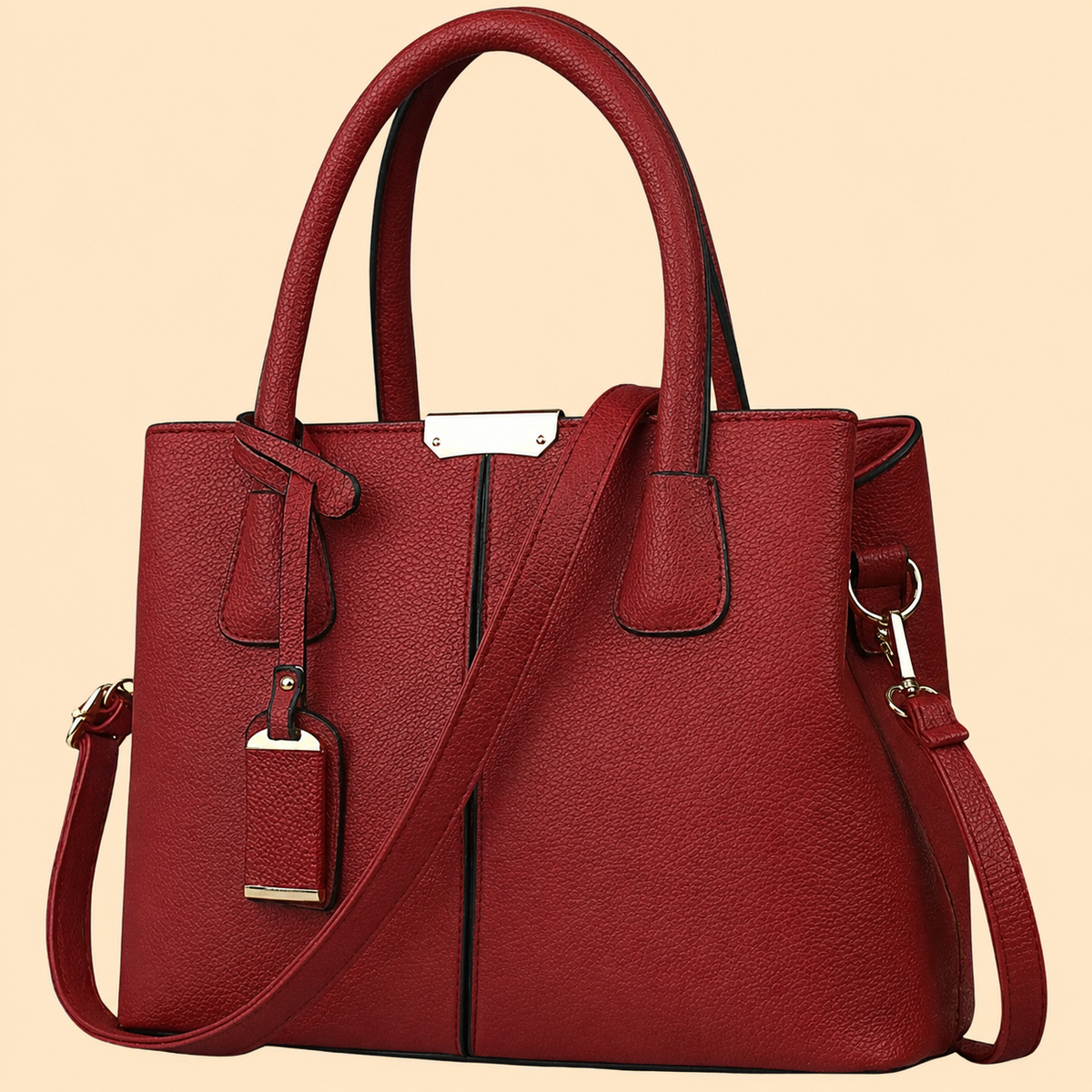 Bolso de mano estructurado con detalle de flecos