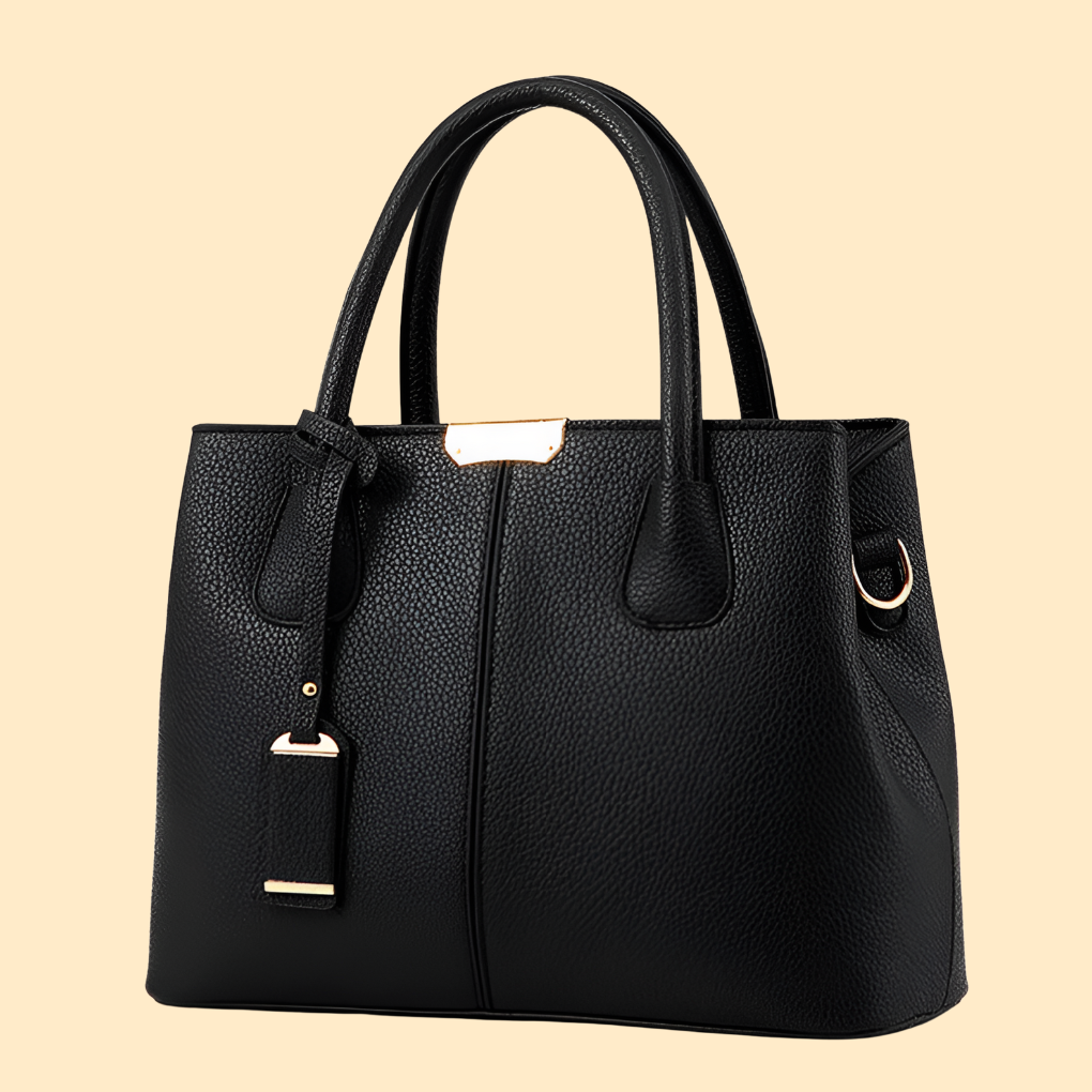 Bolso de mano estructurado con detalle de flecos