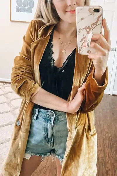 Chaqueta larga de terciopelo con bolsillos