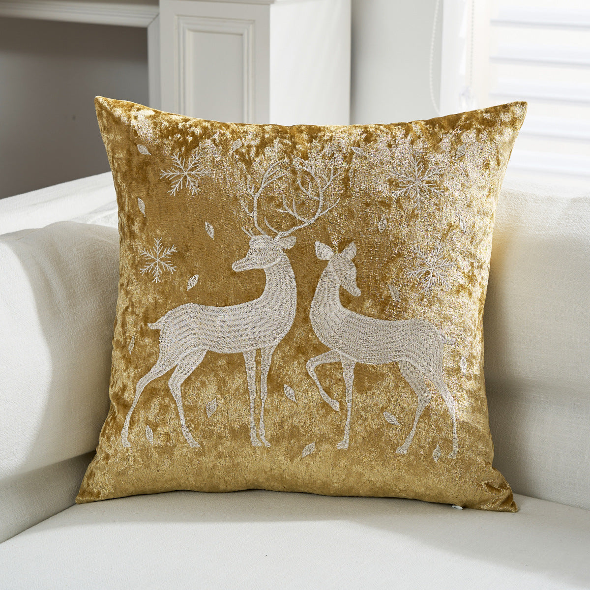 Cojín decorativo de terciopelo con motivo de reno aplicado