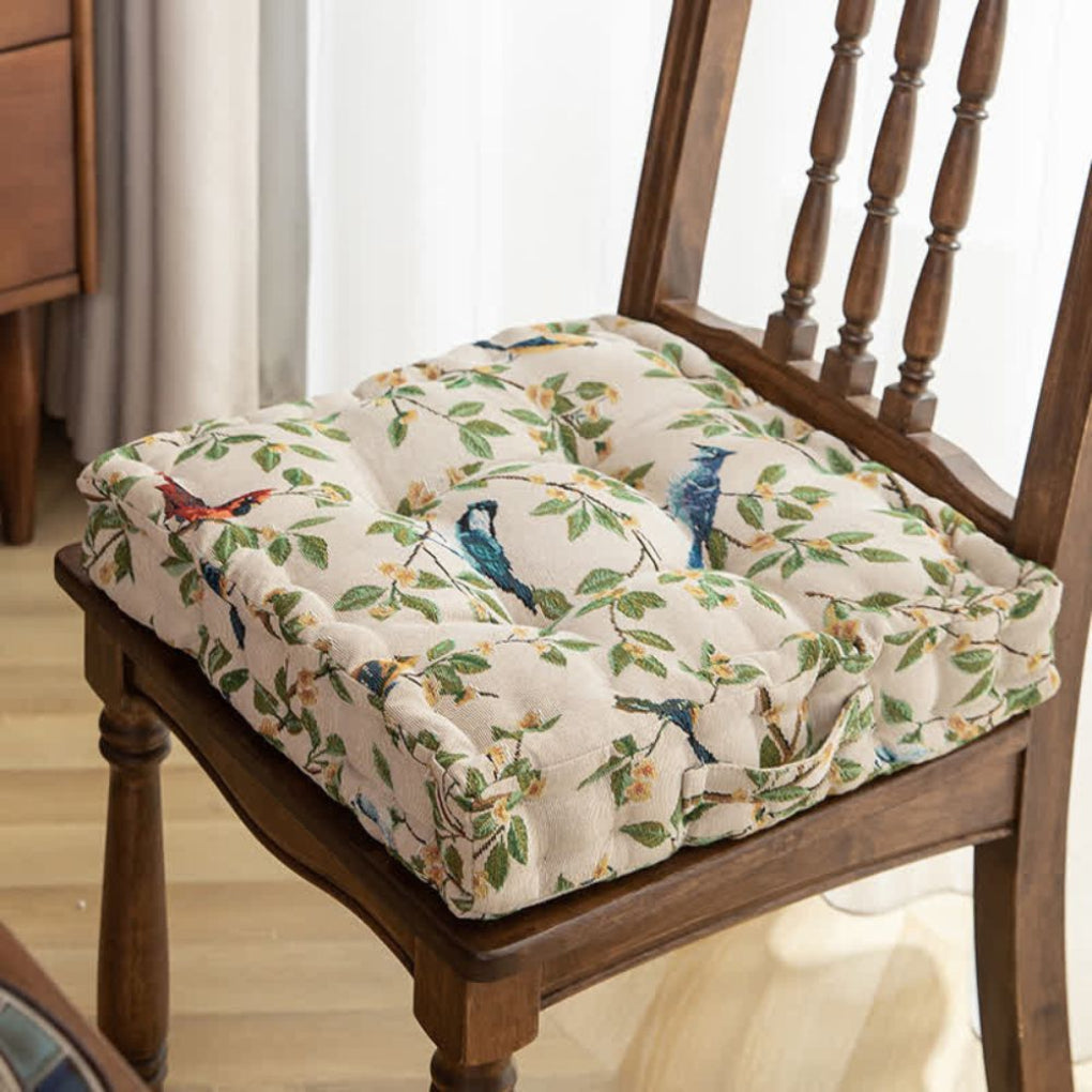 Cojín para silla con estampado de pájaros y hojas