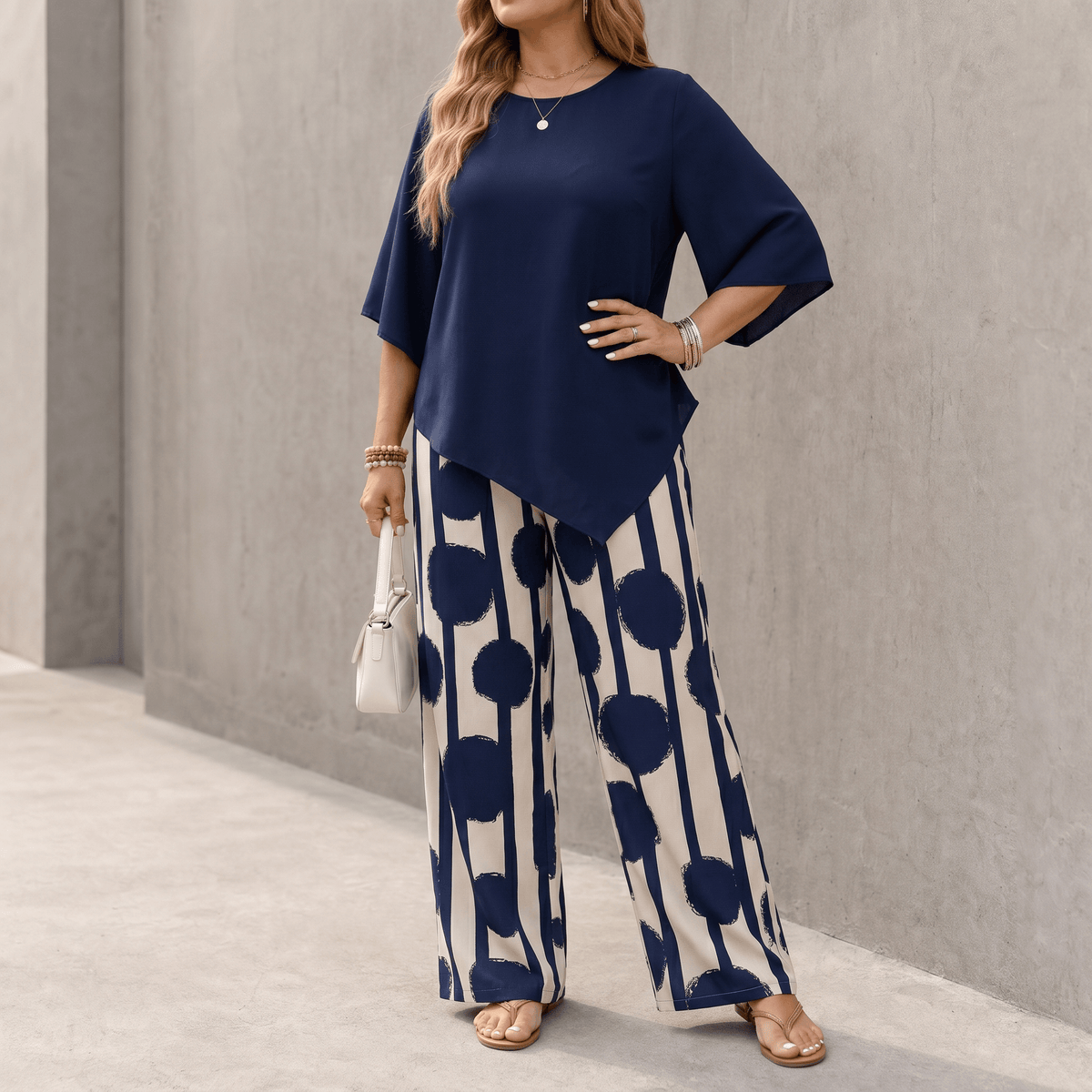 Conjunto de 2 piezas con caída asimétrica y pantalón estampado de pernera ancha