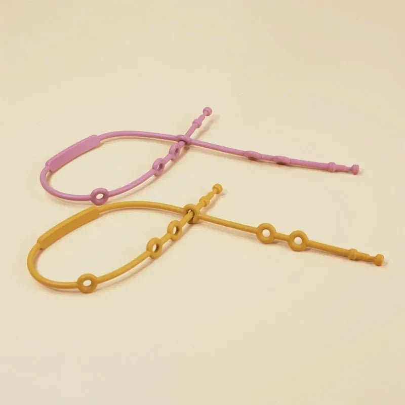 Correas sujetajuguetes de silicona ajustables para un juego seguro