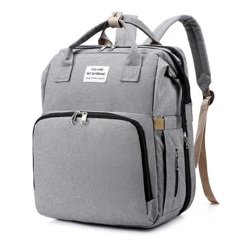 Cuna portátil para bebé y bolso cambiador – Mochila de viaje multifuncional