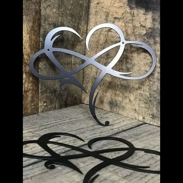Decoración de pared de corazón e infinito de hierro y nácar