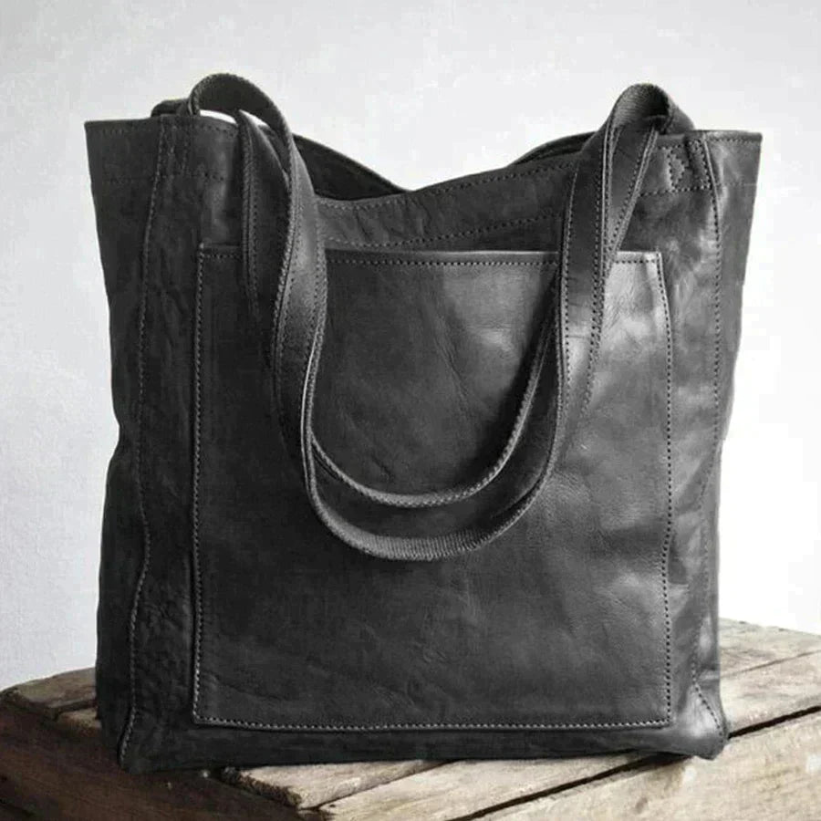 Elegante bolso de mano de piel