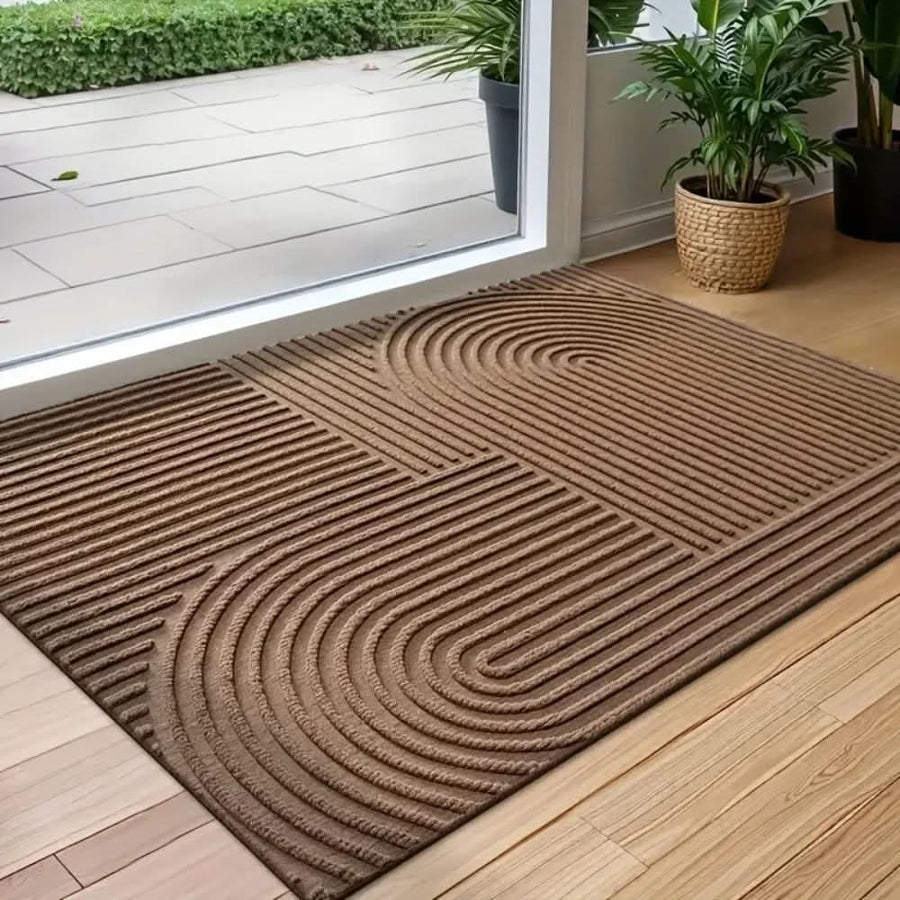 Felpudo de entrada con diseño ondulado, lavable y absorbente