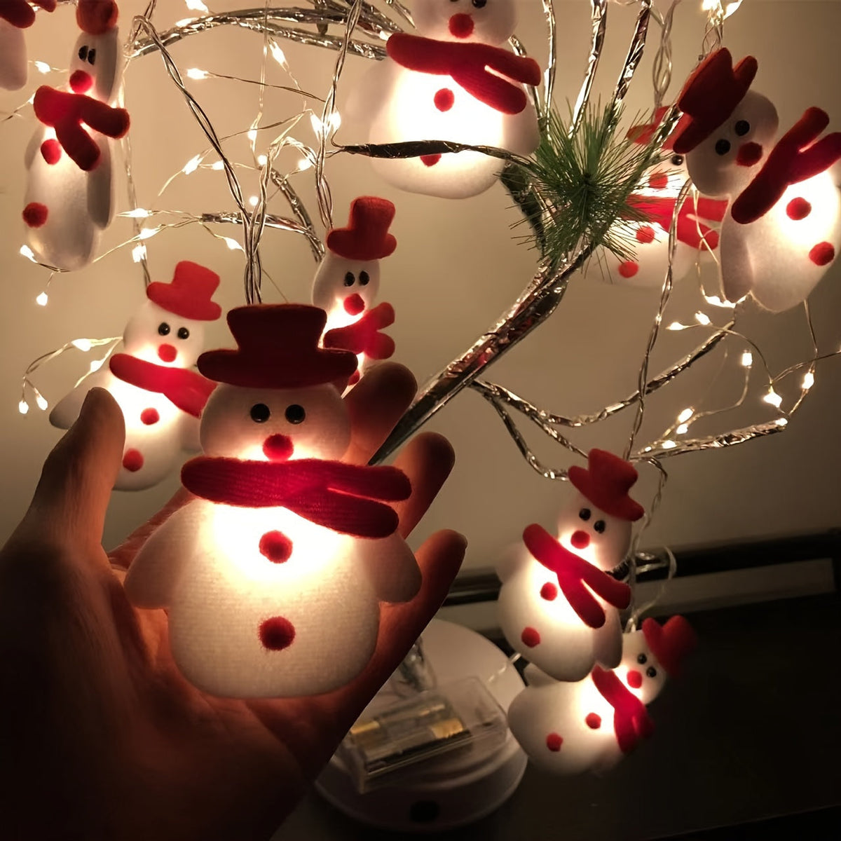 Guirnalda de luces LED con muñecos de nieve de peluche de 1,5 m y luz cálida
