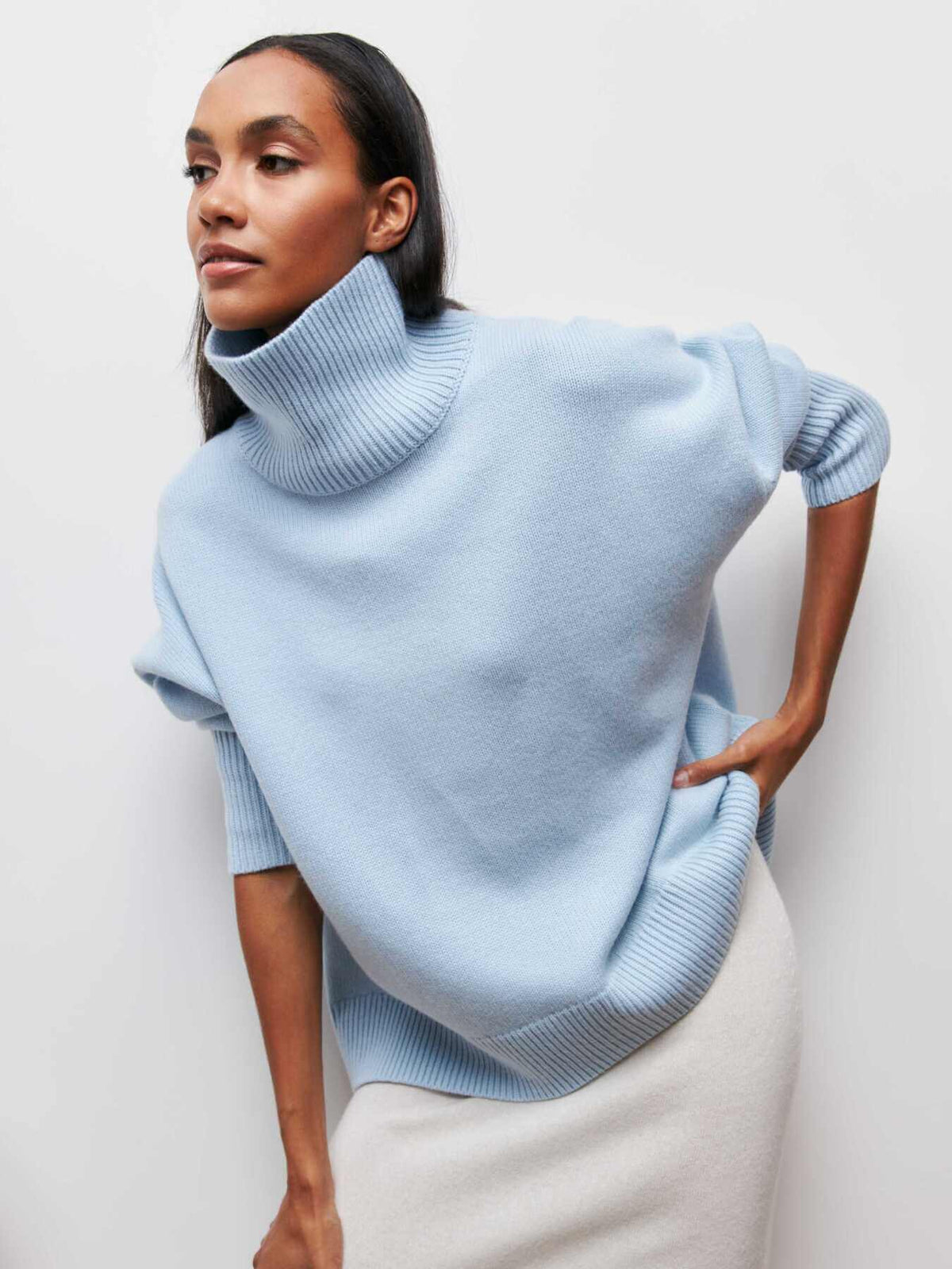 Jersey de punto oversized con cuello alto para mujer