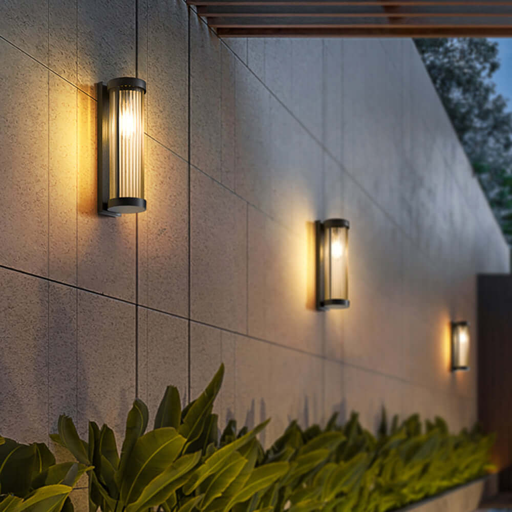 Lámpara solar cilíndrica de exterior en metal y vidrio