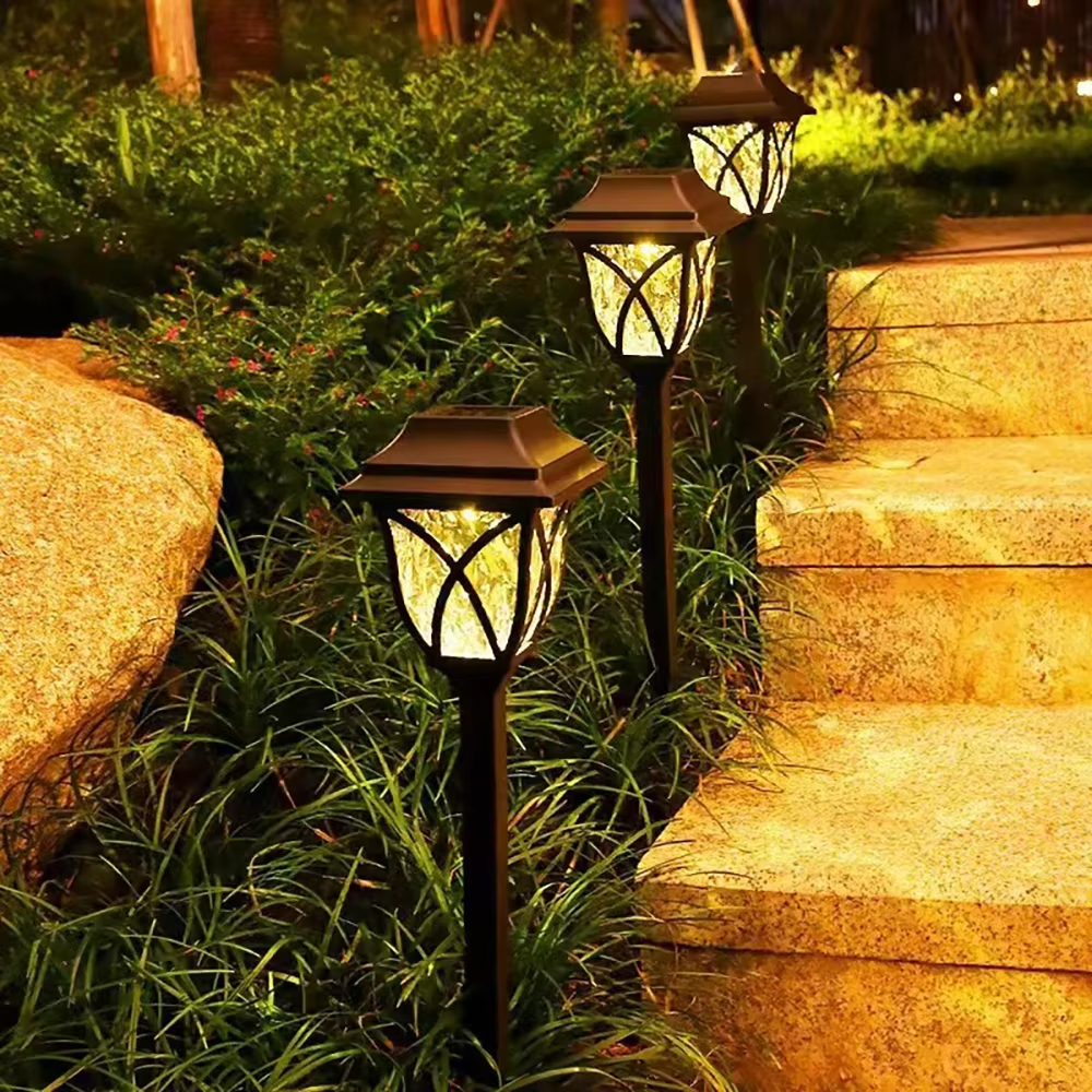 Lámpara solar LED de exterior para jardín y caminos con luz cálida