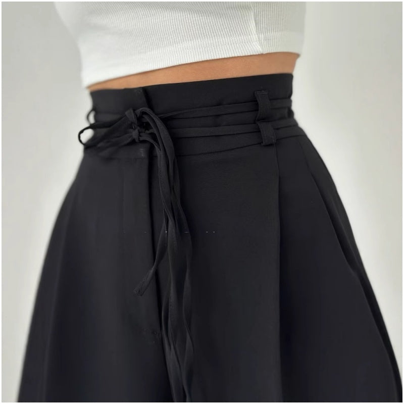 Pantalones de talle alto con pliegues y perneras anchas para mujer