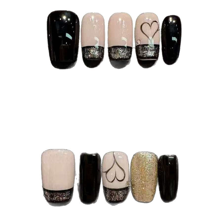 Set de nail art hecho a mano con elegantes detalles de corazón y purpurina