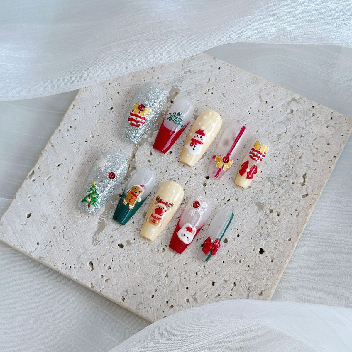 Set de uñas postizas adhesivas con temática navideña