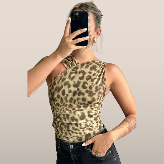 Top asimétrico con estampado animal