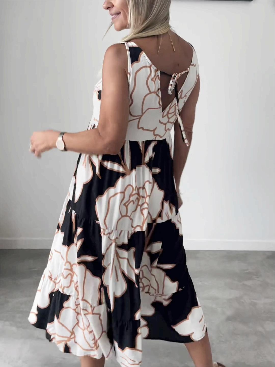 Vestido midi corte A sin mangas con estampado floral