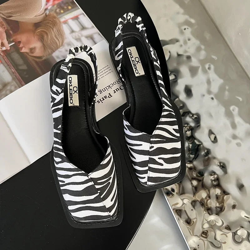 Zapatos destalonados de puntera cuadrada