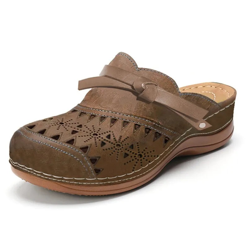 Zuecos sin cordones calados con detalle de lazo para mujer